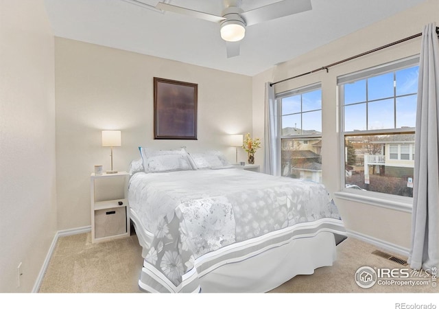 3000 E 112th Ave Unit 102, Northglenn, CO 80233 - bedroom with carpet flooring and a ceiling fan