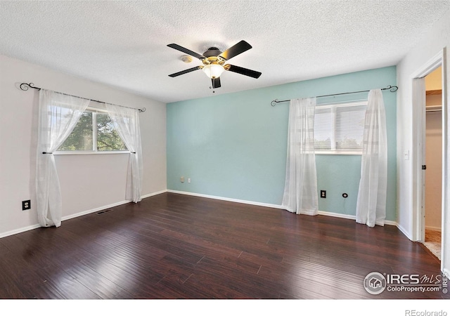 1305 Inverness Dr, Lafayette, CO 80026 - unfurnished room with a ceiling fan, wood finished floors, and a textured ceiling