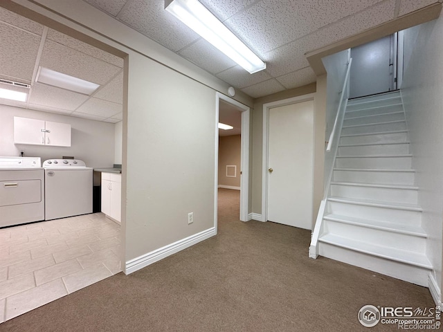 11941 S Clayson St, Parker, CO 80138 - finished below grade area featuring a drop ceiling, separate washer and dryer, light carpet, and stairway
