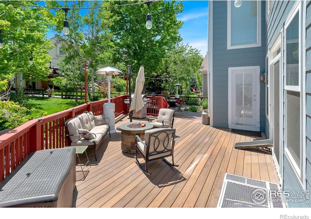 23570 E Holly Hills Way, Parker, CO 80138 - wooden deck with a fire pit