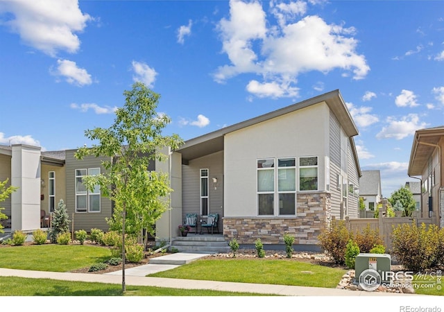 750 Kubat Ln Unit B, Longmont, CO 80503 - view of front of house featuring stone siding