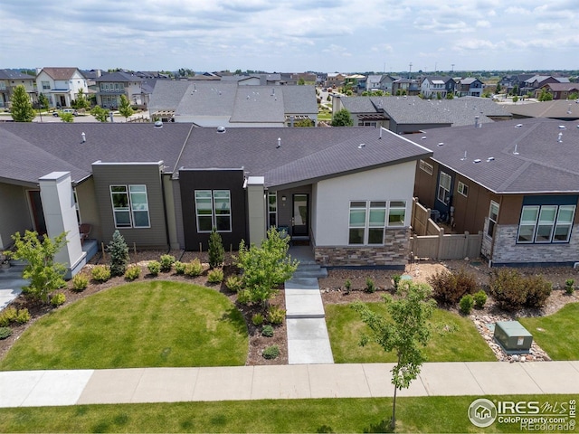 750 Kubat Ln Unit B, Longmont, CO 80503 - view of front of home with a residential view and stone siding