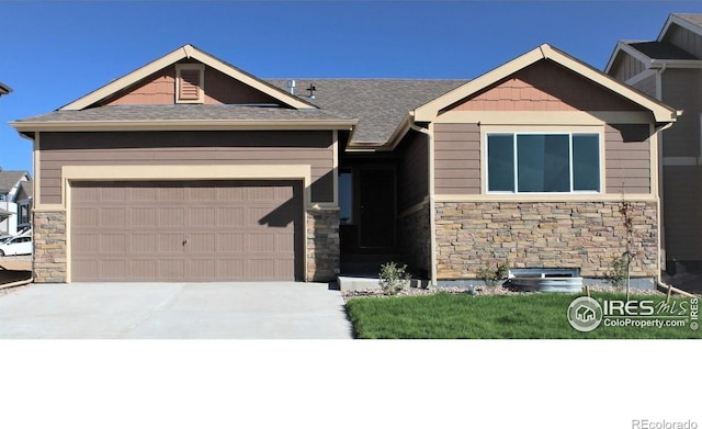 625 87th Ave, Greeley, CO 80634 - craftsman-style home with stone siding, driveway, an attached garage, and a shingled roof