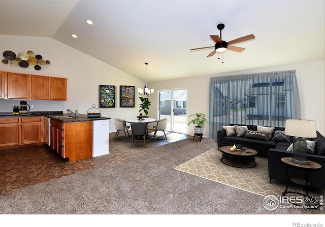 625 87th Ave, Greeley, CO 80634 - kitchen featuring lofted ceiling, brown cabinets, a ceiling fan, a peninsula, and pendant lighting
