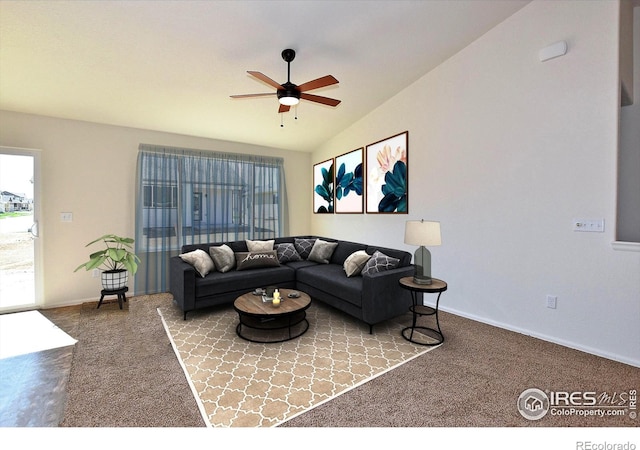 625 87th Ave, Greeley, CO 80634 - living room featuring carpet flooring, lofted ceiling, a ceiling fan, and plenty of natural light