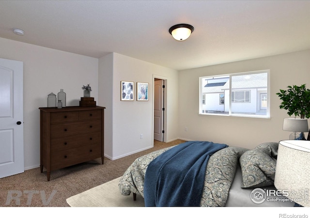 625 87th Ave, Greeley, CO 80634 - carpeted bedroom featuring baseboards