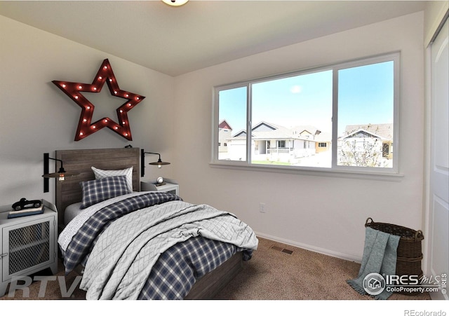 625 87th Ave, Greeley, CO 80634 - carpeted bedroom with baseboards