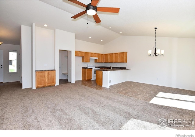 625 87th Ave, Greeley, CO 80634 - kitchen with electric stove, carpet flooring, a peninsula, brown cabinets, and recessed lighting