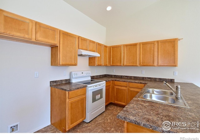 625 87th Ave, Greeley, CO 80634 - kitchen with electric stove, under cabinet range hood, dark countertops, brown cabinetry, and recessed lighting