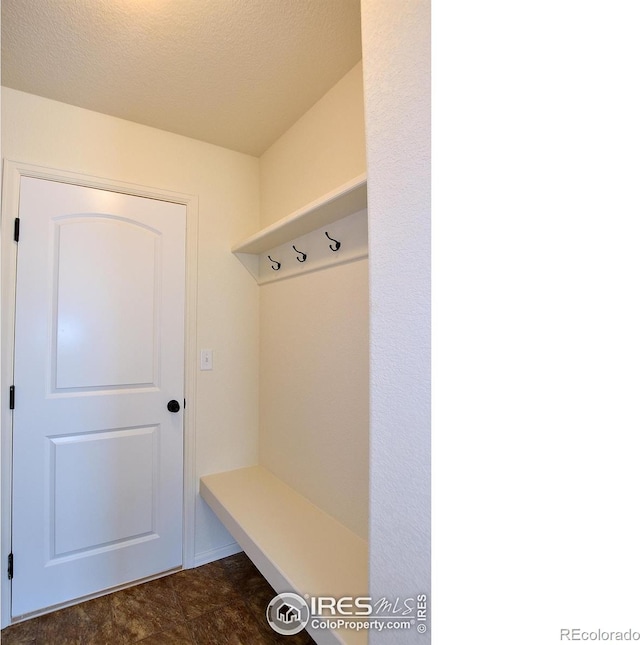 625 87th Ave, Greeley, CO 80634 - mudroom with a textured ceiling