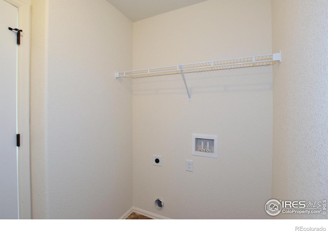 625 87th Ave, Greeley, CO 80634 - laundry room featuring hookup for an electric dryer and hookup for a washing machine