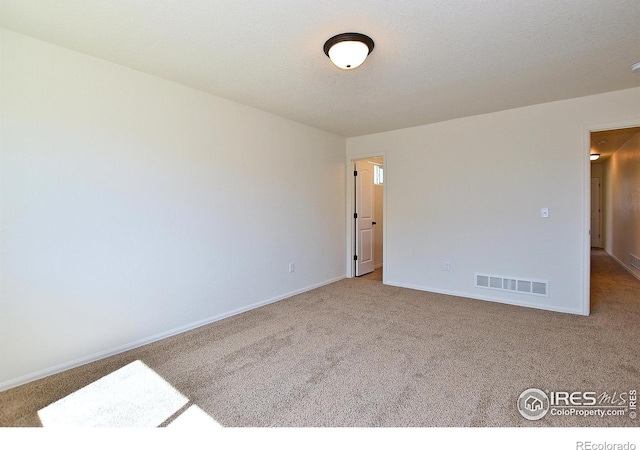 625 87th Ave, Greeley, CO 80634 - carpeted empty room featuring baseboards