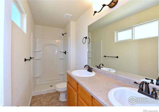 625 87th Ave, Greeley, CO 80634 - full bath featuring a shower and double vanity