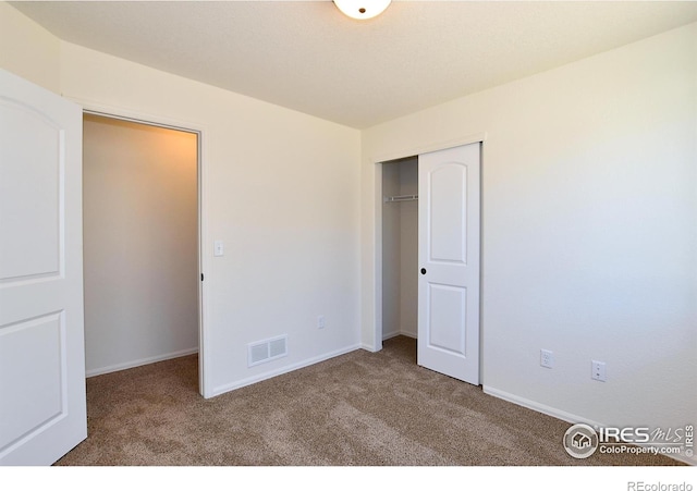 625 87th Ave, Greeley, CO 80634 - unfurnished bedroom with carpet floors and a closet