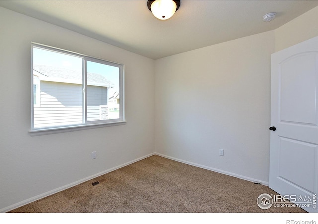 625 87th Ave, Greeley, CO 80634 - unfurnished room with carpet floors and a smoke detector