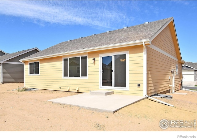 625 87th Ave, Greeley, CO 80634 - rear view of property featuring a patio and roof with shingles