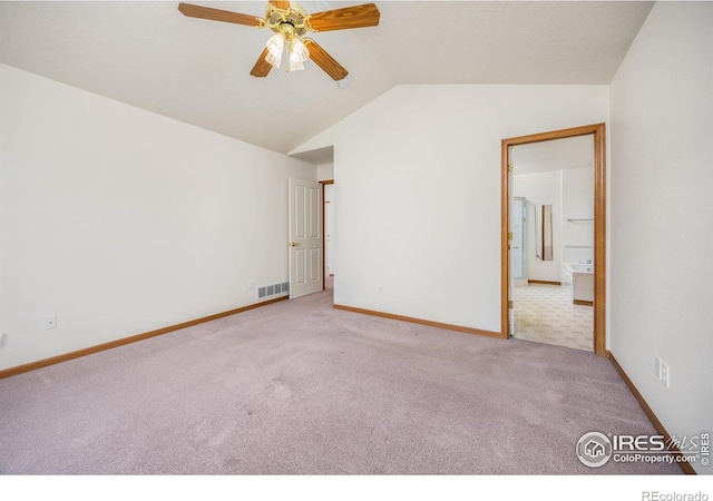 1754 45th Ave, Greeley, CO 80634 - carpeted empty room featuring lofted ceiling and a ceiling fan