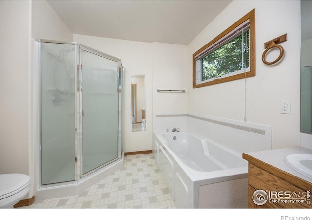 1754 45th Ave, Greeley, CO 80634 - bathroom with a shower stall, vanity, and a garden tub