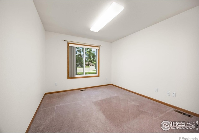 1754 45th Ave, Greeley, CO 80634 - unfurnished room featuring carpet flooring