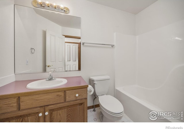 1754 45th Ave, Greeley, CO 80634 - full bath featuring vanity, shower / bathtub combination, and tile patterned floors