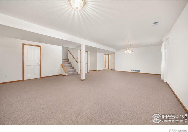 1754 45th Ave, Greeley, CO 80634 - basement featuring carpet and stairway