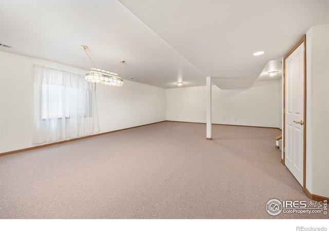1754 45th Ave, Greeley, CO 80634 - basement featuring carpet floors and baseboards