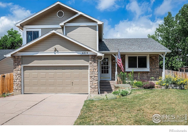 6019 S Pierson Ct, Littleton, CO 80127 - view of front of property with stone siding, concrete driveway, a garage, and roof with shingles
