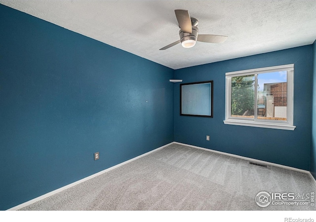 6019 S Pierson Ct, Littleton, CO 80127 - unfurnished room featuring carpet, a textured ceiling, and ceiling fan