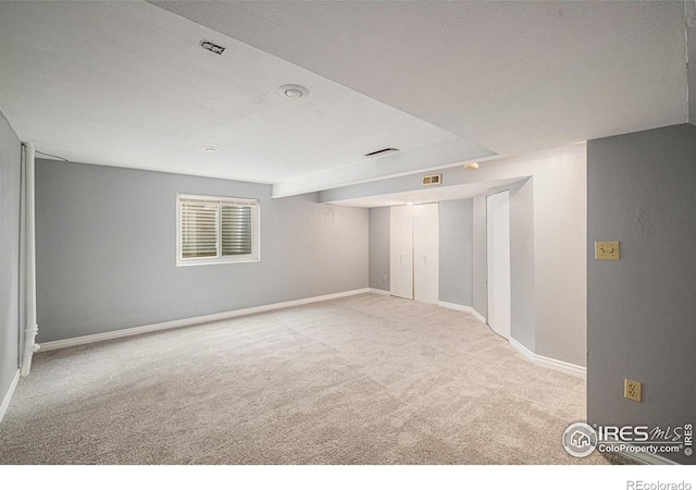 6019 S Pierson Ct, Littleton, CO 80127 - below grade area with carpet and baseboards