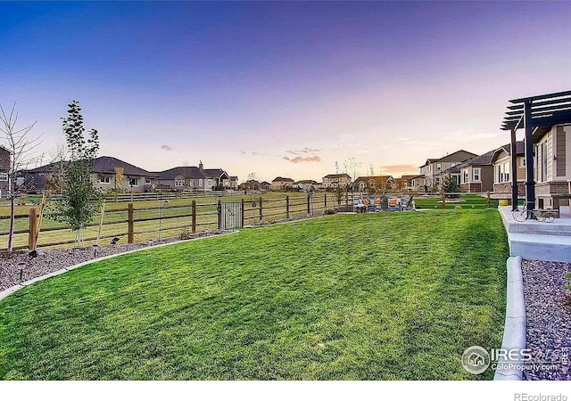 8541 Allenbrook Dr, Windsor, CO 80550 - yard at dusk with a residential view