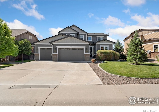 8541 Allenbrook Dr, Windsor, CO 80550 - craftsman inspired home featuring a front yard, an attached garage, and concrete driveway