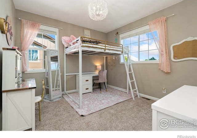 8541 Allenbrook Dr, Windsor, CO 80550 - carpeted bedroom featuring a chandelier and a desk