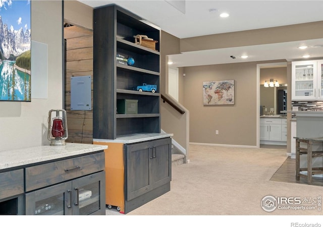 8541 Allenbrook Dr, Windsor, CO 80550 - office area featuring light colored carpet and recessed lighting