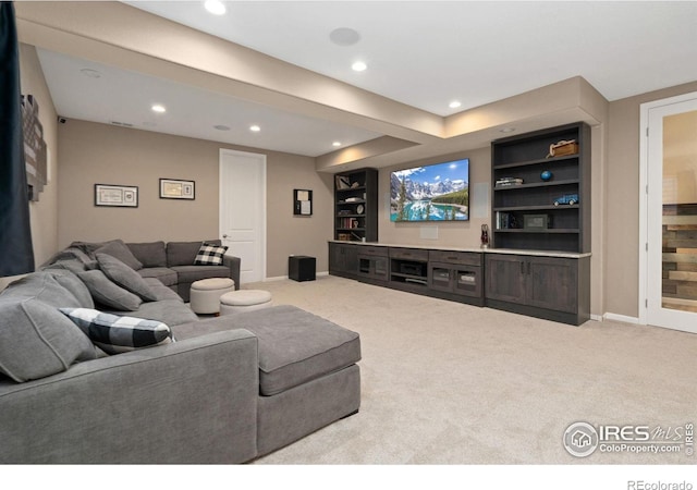 8541 Allenbrook Dr, Windsor, CO 80550 - living area with carpet and recessed lighting