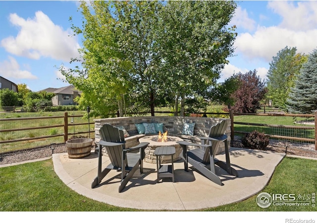 8541 Allenbrook Dr, Windsor, CO 80550 - view of patio with a fire pit