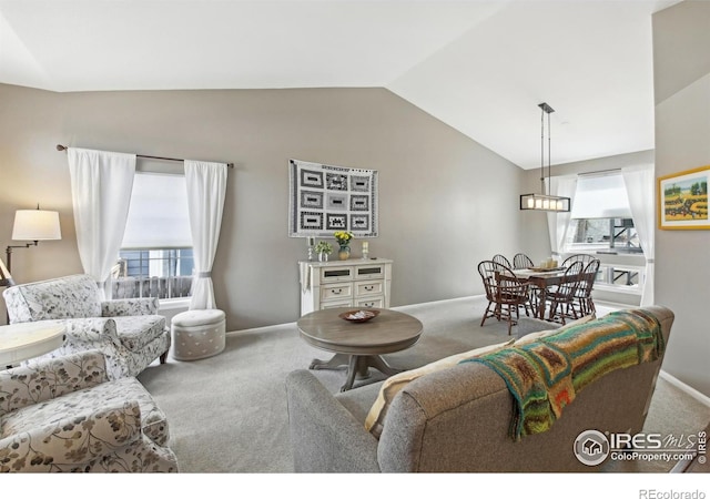 4644 W 112th Ct, Westminster, CO 80031 - living room featuring carpet flooring, healthy amount of natural light, and vaulted ceiling