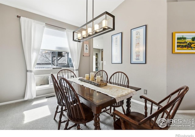 4644 W 112th Ct, Westminster, CO 80031 - dining room with carpet flooring and a chandelier
