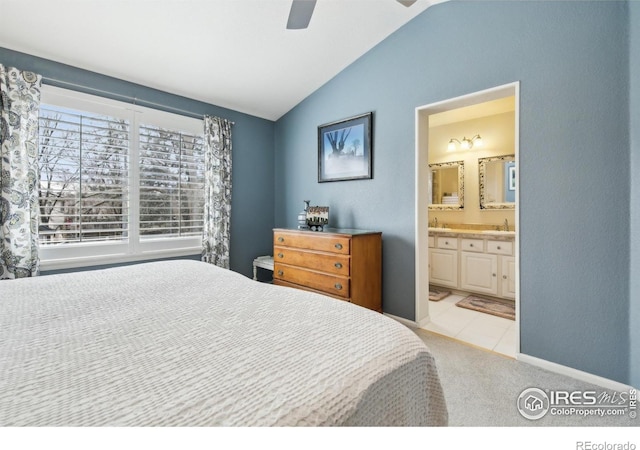 4644 W 112th Ct, Westminster, CO 80031 - carpeted bedroom with vaulted ceiling, ensuite bath, and ceiling fan