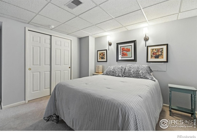 4644 W 112th Ct, Westminster, CO 80031 - carpeted bedroom featuring a paneled ceiling and a closet