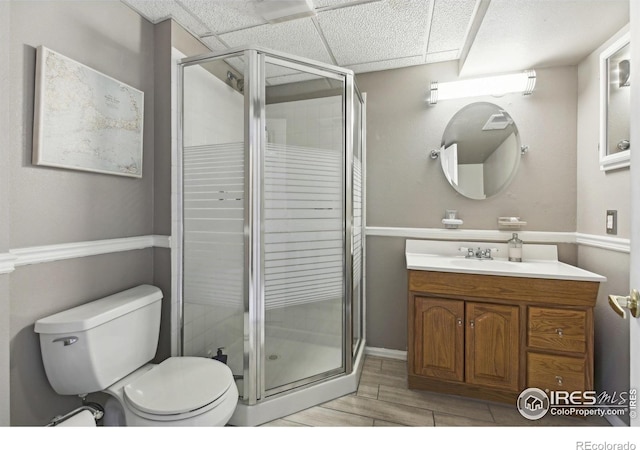 4644 W 112th Ct, Westminster, CO 80031 - bathroom with vanity, a shower stall, and wood finish floors