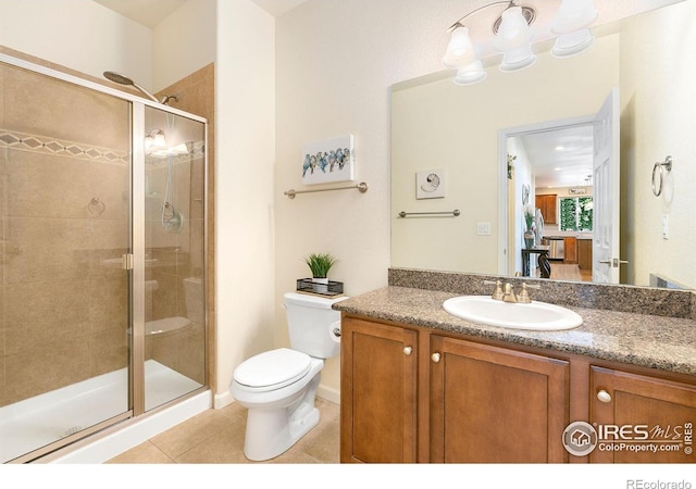 5355 Brookline Dr, Timnath, CO 80547 - bathroom with a stall shower, vanity, and tile patterned floors