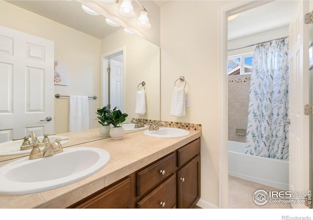 5355 Brookline Dr, Timnath, CO 80547 - bathroom with double vanity and shower / bath combo