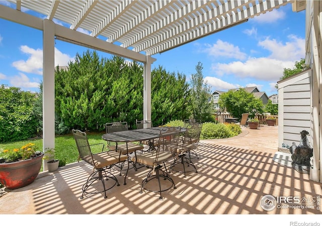 5355 Brookline Dr, Timnath, CO 80547 - view of patio with outdoor dining area and a pergola