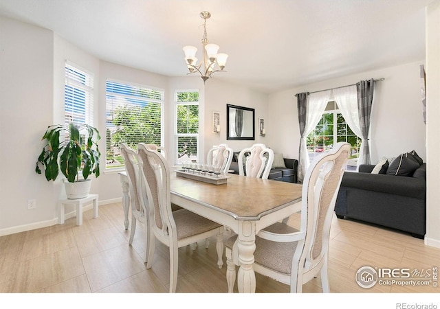 5355 Brookline Dr, Timnath, CO 80547 - dining area featuring a chandelier and baseboards