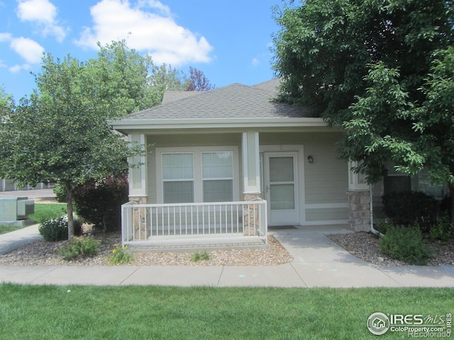 1900 68th Ave Unit 701, Greeley, CO 80634 - bungalow with a porch and roof with shingles