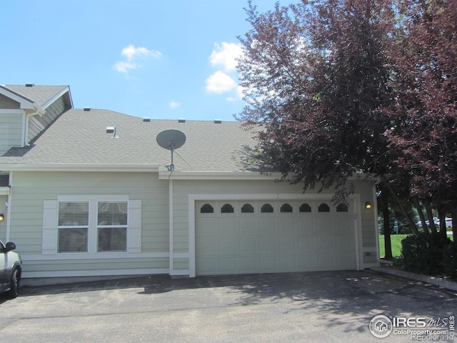 1900 68th Ave Unit 701, Greeley, CO 80634 - view of front of property featuring a shingled roof