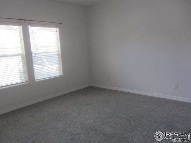 1900 68th Ave Unit 701, Greeley, CO 80634 - carpeted empty room with plenty of natural light