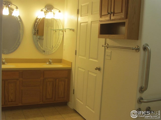 1900 68th Ave Unit 701, Greeley, CO 80634 - bathroom featuring tile patterned floors and double vanity