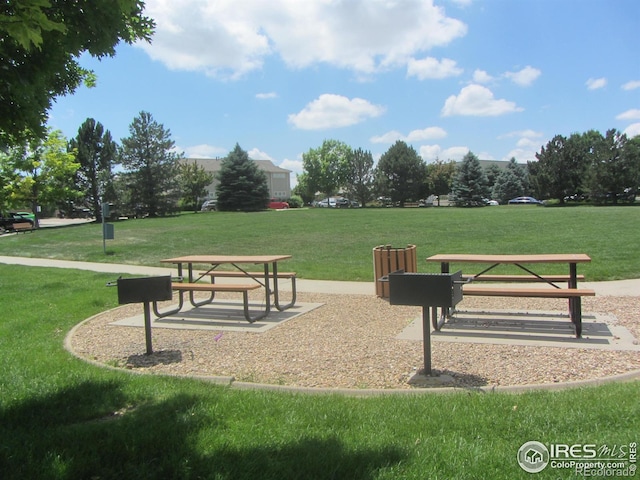 1900 68th Ave Unit 701, Greeley, CO 80634 - view of community featuring a lawn