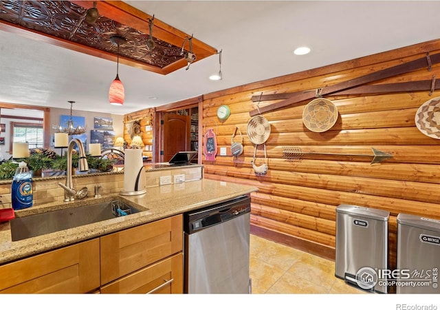 2238 Eagle Cliff Rd, Estes Park, CO 80517 - kitchen with stainless steel dishwasher, recessed lighting, light stone countertops, decorative light fixtures, and light tile patterned floors